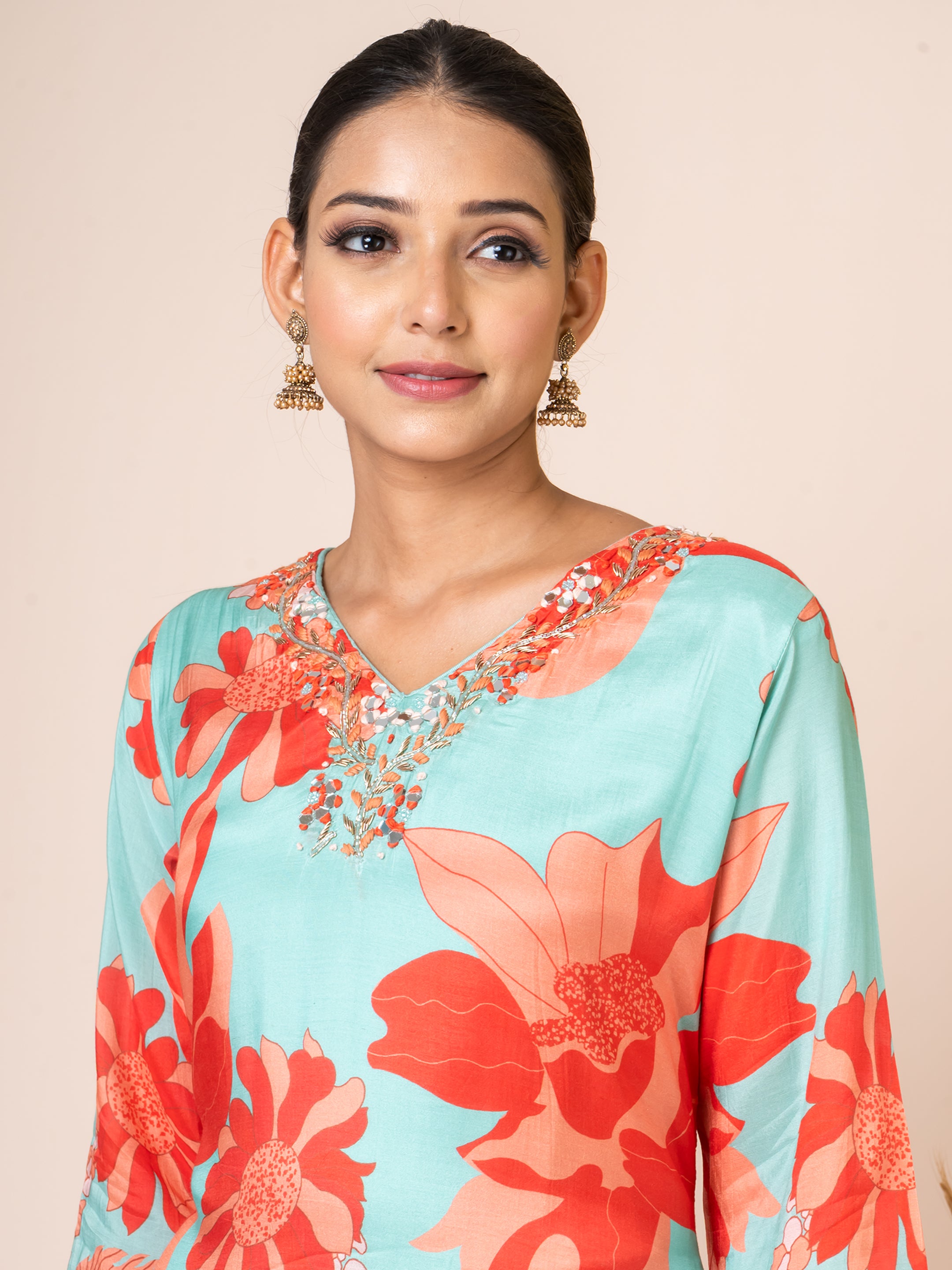 Elegant Turquoise Floral Handwork Kurta Set by Sarso Sarso
